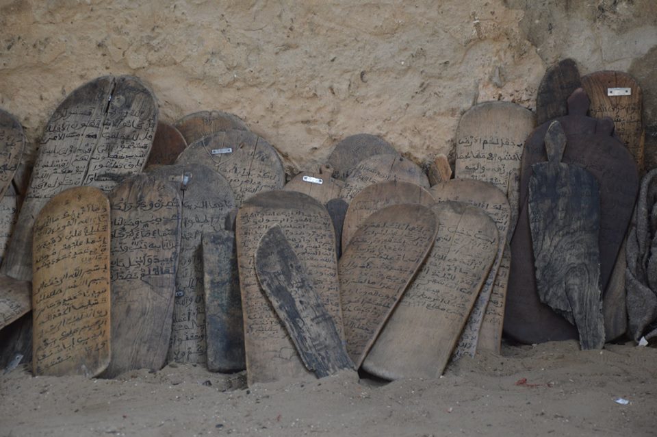 Photo of Qur'anic verses written on wooden boards in West Africa