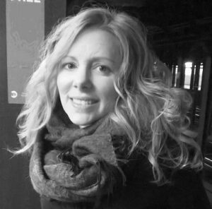 A black and white profile picture of Professor Amy Adamcyzk